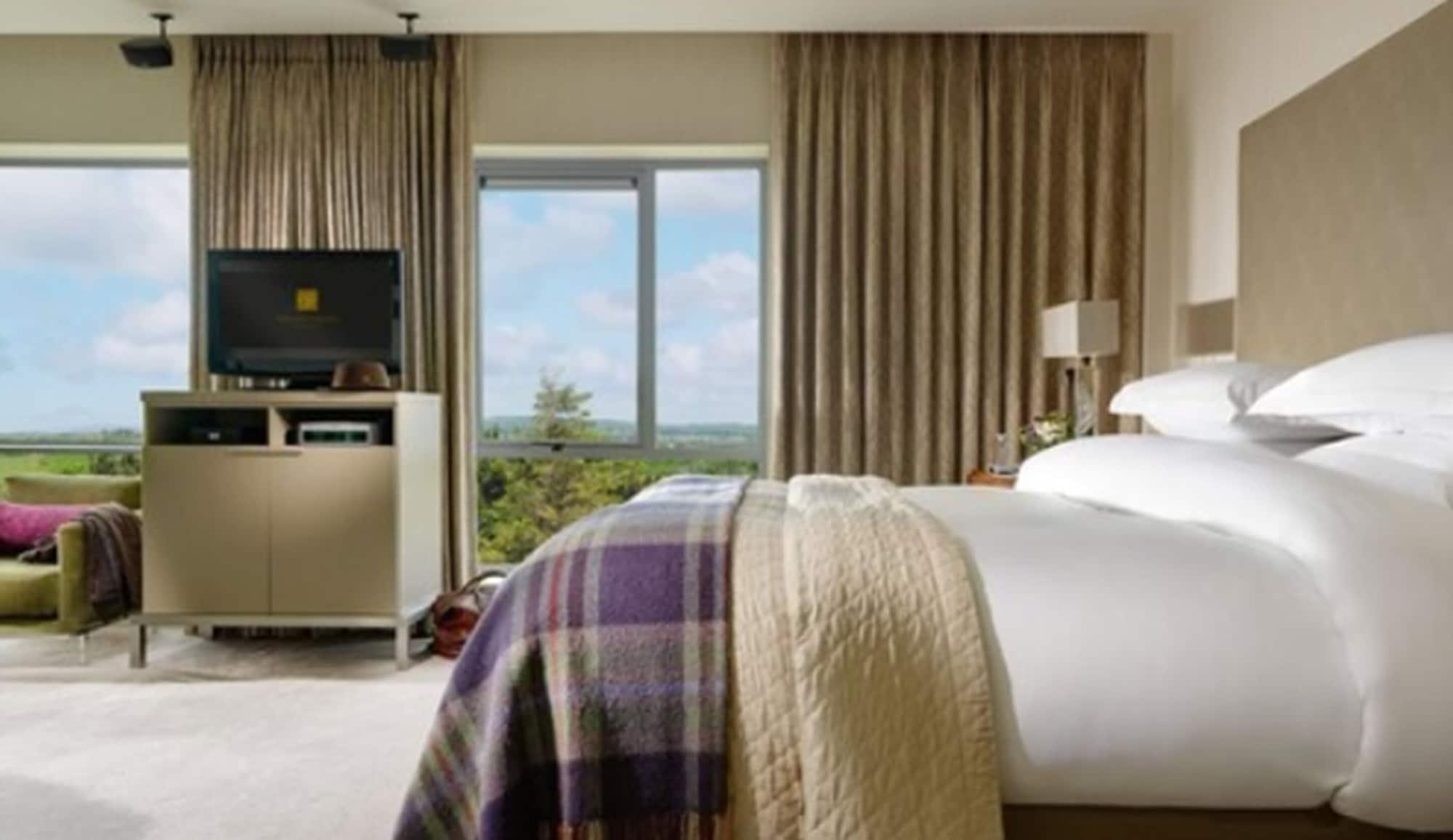 فندق وسبا أغادوي هايتس كيلارني المظهر الخارجي الصورة A bedroom at the hotel